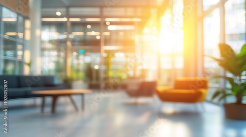 Sunlit modern office lobby with sleek furniture and large windows, creating a warm and inviting atmosphere for professionals and visitors alike.