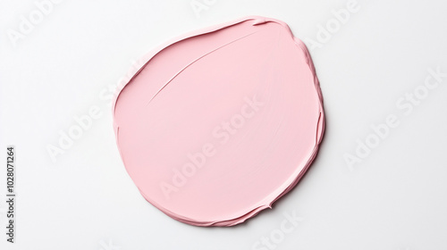 a paint swatch in a soft pink color on a pristine white background