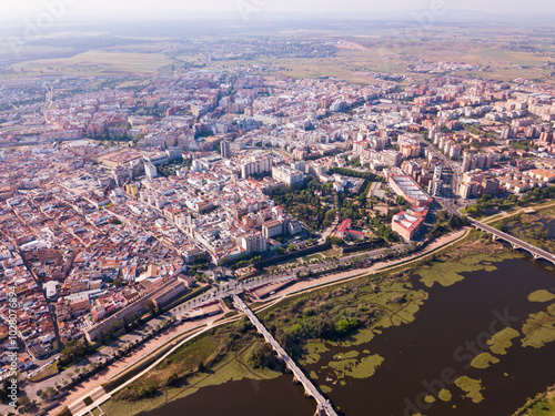 View from drone of Spanish city of Badajoz on both sides of Guadiana river on sunny spring day photo