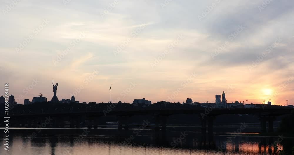 Beautiful view of the Mother Ukraine monument Paton Bridge on the Dnipro river in Kyiv, Ukraine Beautiful view of the Mother Ukraine monument Paton Bridge on the Dnipro river in Kyiv, Ukraine