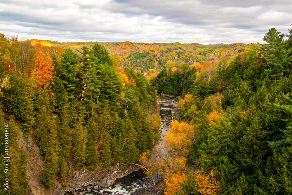 Coaticook, Canada - Oct. 12 2024: Colorful autumn season in Parc de la Gorge Coaticook, Canada - Oct. 12 2024: Colorful autumn season in Parc de la Gorge