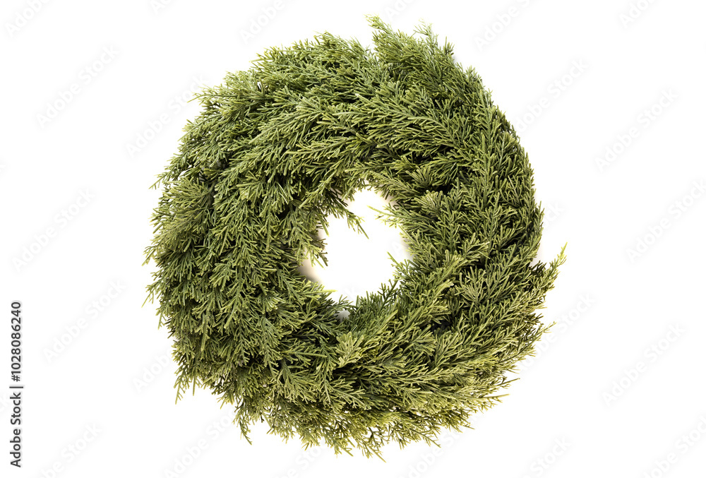 Christmas wreath made of artificial spruce branches for home decoration, on a white background Christmas wreath made of artificial spruce branches for home decoration, on a white background