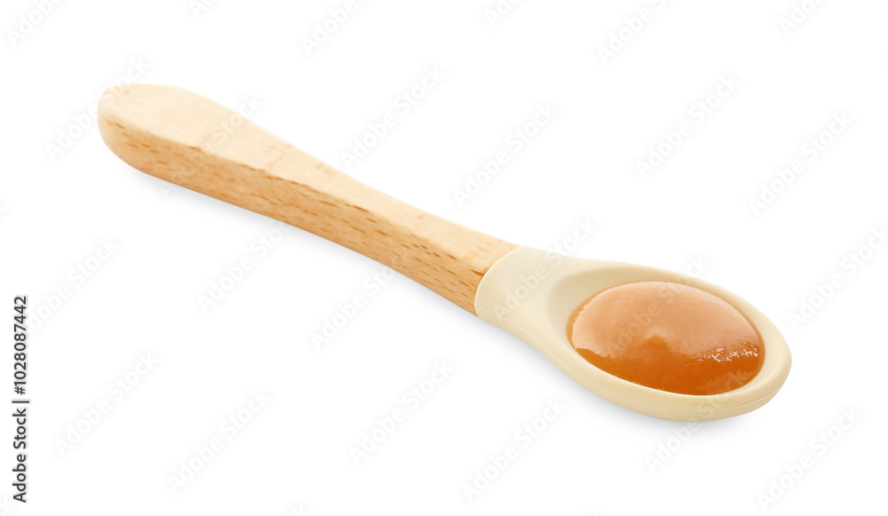 Spoon with tasty baby food isolated on white Spoon with tasty baby food isolated on white