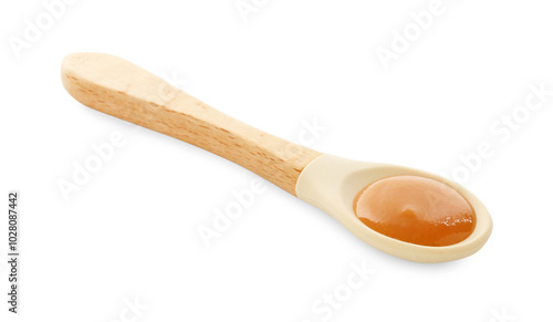 Spoon with tasty baby food isolated on white