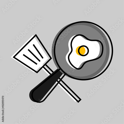 Frying pan and spatula on gray background.