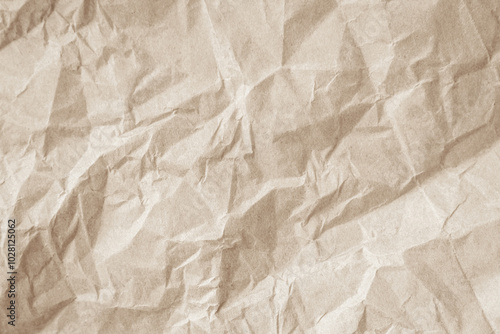 Crumpled brown paper texture background for design with copy space for text or image.