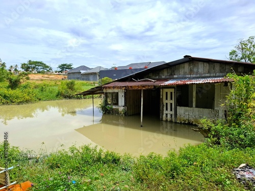 old house submerged in water