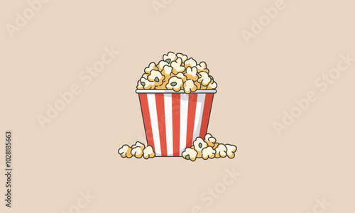 Striped box of popcorn with kernels scattered around.