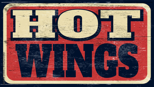 Aged retro Hot wings sign on wood