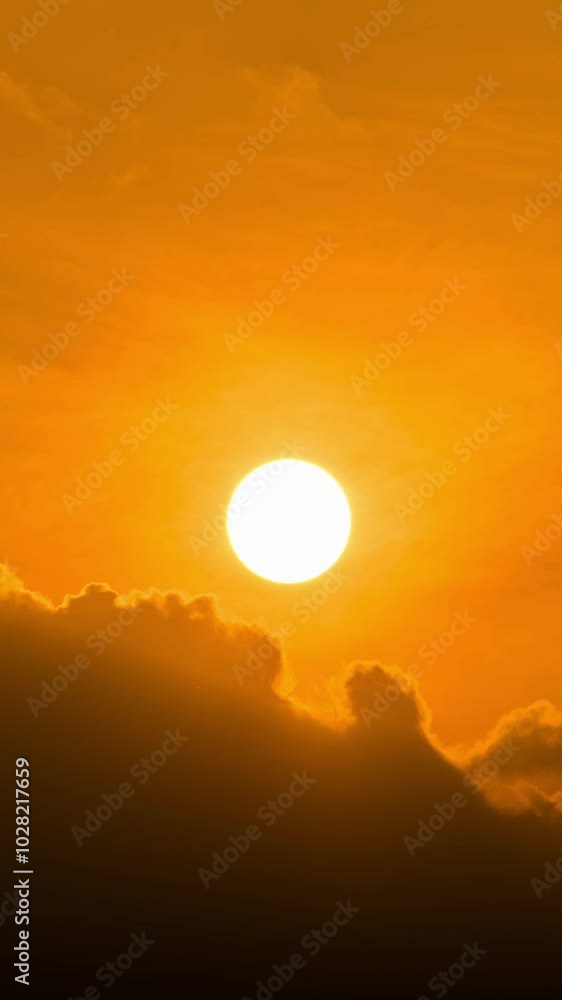 Timelapse of dramatic sunrise with orange sky in a cloudy day. Timelapse of dramatic sunrise with orange sky in a cloudy day.