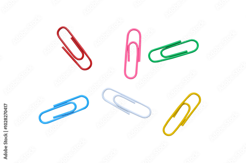 Multicolored paper clips on white background with clipping path. Office paper clip. Multicolored paper clips on white background with clipping path. Office paper clip.