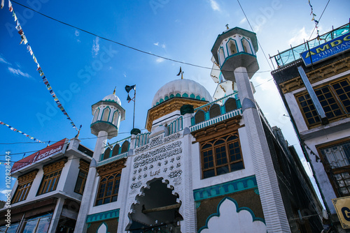 A mosque locate at main shopping street in downtown of Leh City photo