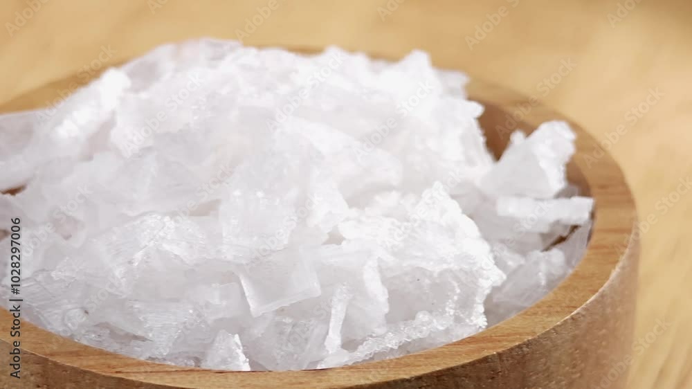Flower of Salt, a crystals on salt ponds' in wooden bowl.
Flower of Salt, a crystals on salt ponds' in wooden bowl.