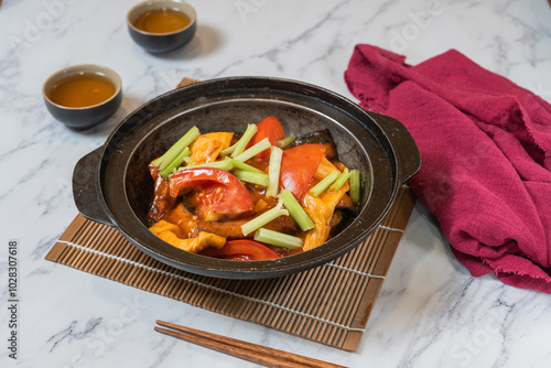 Braised Vegetarian Fish, Fresh Bean Curd Sheet and Tomato in Casserole photo