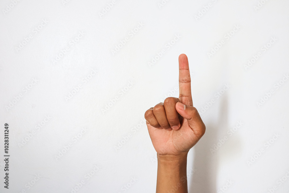 Indonesian hand with1 open finger gesture Indonesian hand with1 open finger gesture