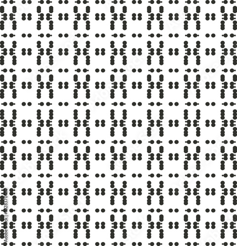 Small dots are arranged in separate rows and figures or symbols.