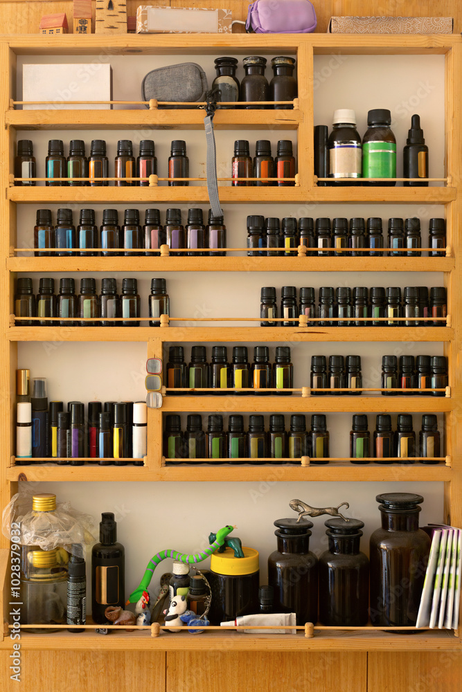 Essential oil bottles arranged in shelves Essential oil bottles arranged in shelves