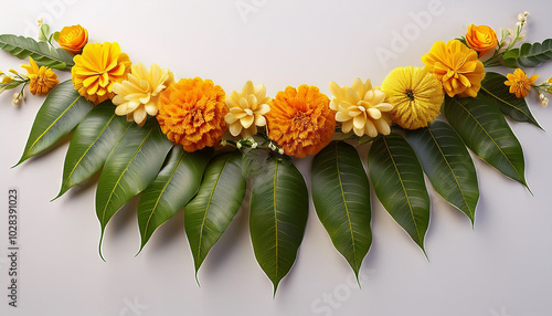 Indian flower garland of mango leaves and marigold flowers. Ugadi diwali ganesh festival poojas weddings functions holiday ornate decoration. white background natural mango leaf garland. photo