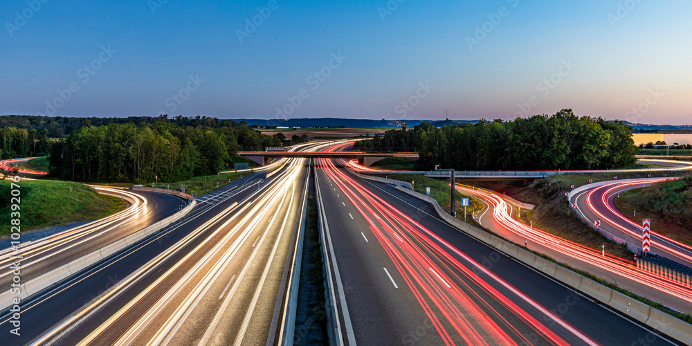 Light trails of vehicles on highway road at dusk in Stuttgart, Baden-W�rttemberg, Germany Light trails of vehicles on highway road at dusk in Stuttgart, Baden-W�rttemberg, Germany