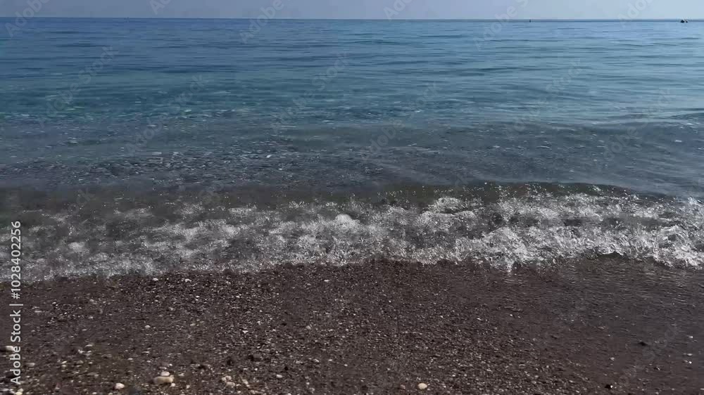 Clear sea water, rocky bottom. Waves Clear sea water, rocky bottom. Waves