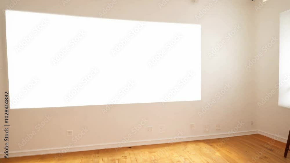 Camera pans through a bright artist's studio with white canvas walls, ready for inspiration. high key lighting enhances the creative atmosphere Camera pans through a bright artist's studio with white canvas walls, ready for inspiration. high key lighting enhances the creative atmosphere
