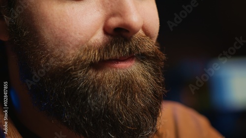 Happy computer scientist feeling satisfied after removing all bugs while coding on workstation desktop. Teleworking upbeat IT specialist pleased after solving script errors, camera A extreme close up