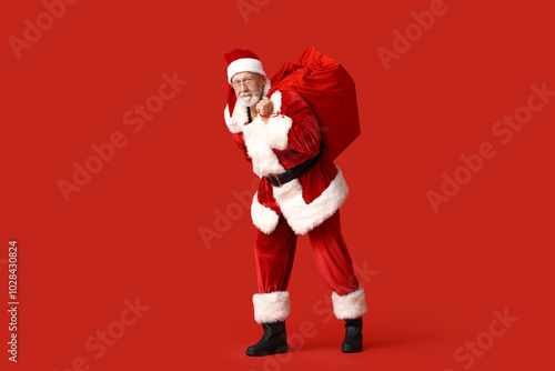 Santa Claus with bag full o...