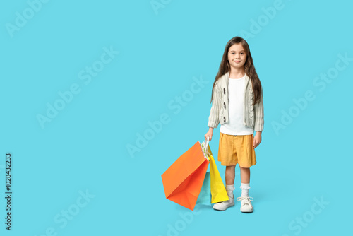 Cute little girl in stylish...