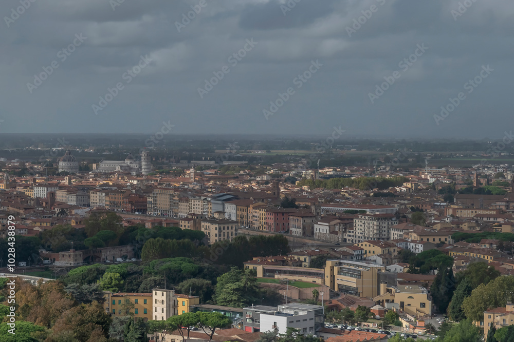 Aerial view of the center of Pisa, Italy, under a very cloudy sky Aerial view of the center of Pisa, Italy, under a very cloudy sky