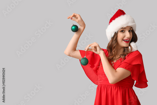 Happy young woman in Santa ...