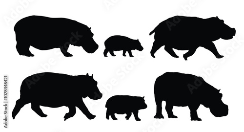 The set silhouette of large hippos.
