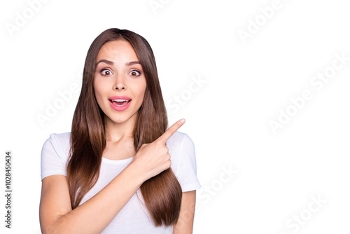 Close up photo of impressed lady showing recommendation scream unbelievable wearing white t-shirt isolated over blue background