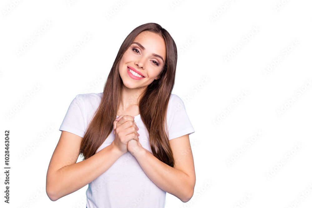 Portrait of pretty girl with fists wearing white t-shirt isolated over blue background Portrait of pretty girl with fists wearing white t-shirt isolated over blue background