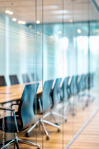 Obraz na płótnie Bright modern conference room with glass walls, sleek black chairs, and large windows, symbolizing transparency, corporate collaboration, and open office design w salonie