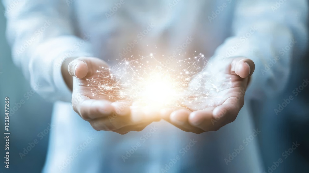 A person holding glowing energy in their hands, symbolizing hope, magic, or inspiration in a serene setting. A person holding glowing energy in their hands, symbolizing hope, magic, or inspiration in a serene setting.