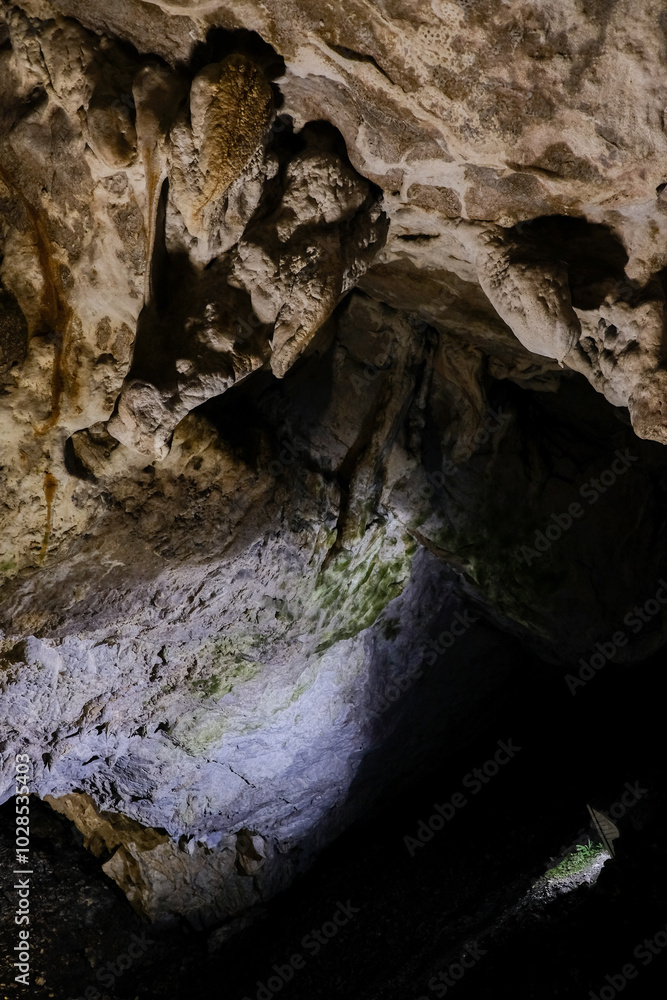 Inside of the cave with geological stone shapes Inside of the cave with geological stone shapes