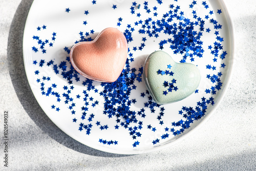 Romantic table setting with hearts and star confetti