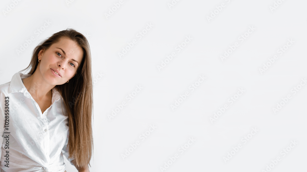 Young smiling confident business woman wearing white top shirt casual clothes looking camera isolated on grey background studio portrait with copy space. Lifestyle concept. Professional office worker Young smiling confident business woman wearing white top shirt casual clothes looking camera isolated on grey background studio portrait with copy space. Lifestyle concept. Professional office worker