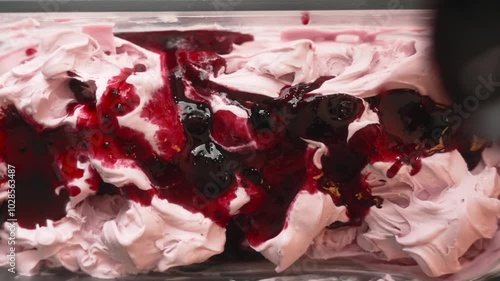 Wallpaper Mural Top view footage of pouring strawberry sauce over berries ice cream, with blurred background Torontodigital.ca