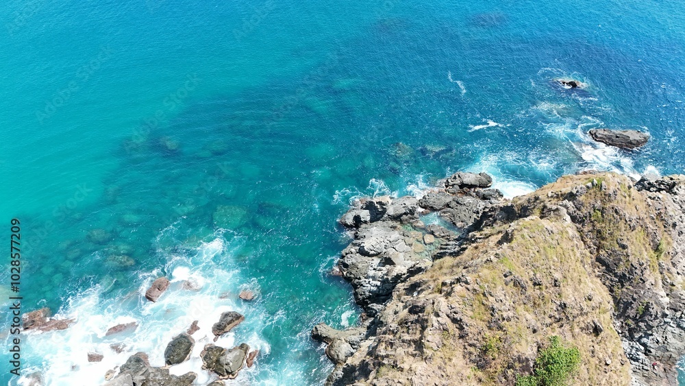 Rocky coastline with turquoise water from above Rocky coastline with turquoise water from above