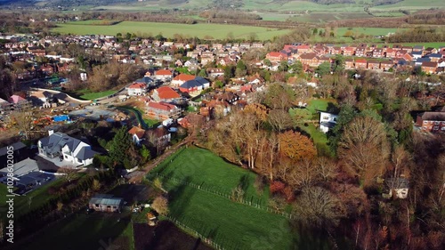 Aerial footage of the residential neighborhoods near Bearsted Woodland Trust in Bearsted, England photo