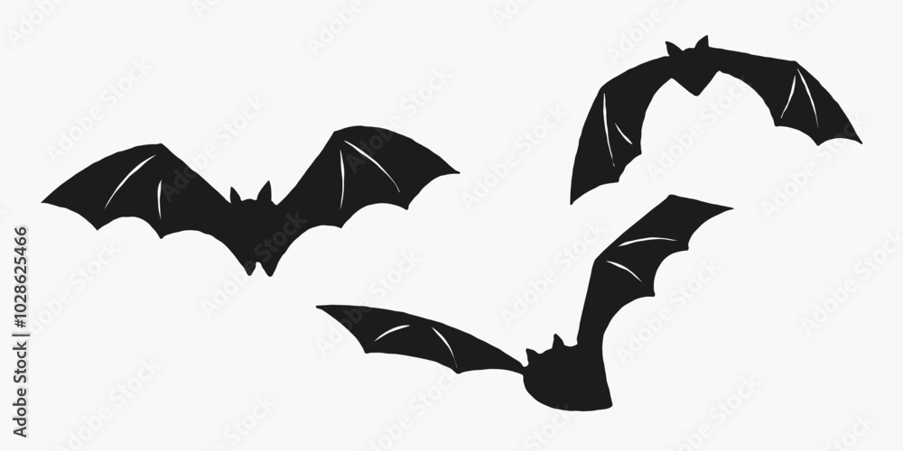 Naklejka premium Silhouettes of three flying bats on a light background. Simple black bat illustrations. Halloween decoration concept for design and print.