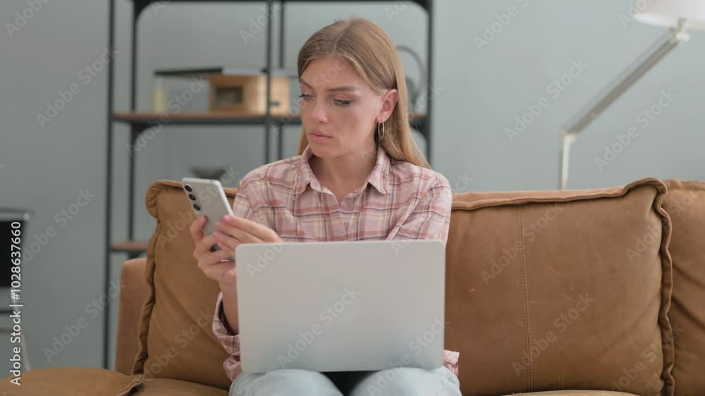 Young Woman Using Laptop and Smartphone while Sitting Outdoor Young Woman Using Laptop and Smartphone while Sitting Outdoor