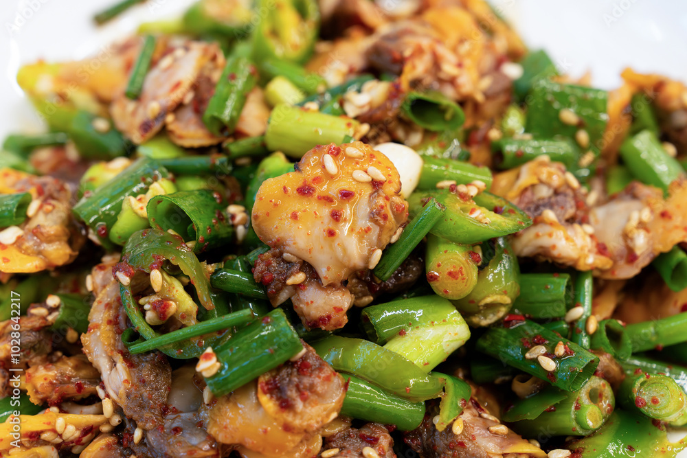 blanched cockles seasoned with sesame oil, green onion, chili, soy sauce and sesame seeds blanched cockles seasoned with sesame oil, green onion, chili, soy sauce and sesame seeds