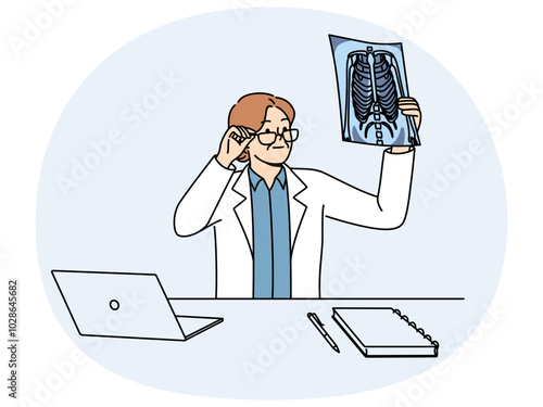 Woman doctor holding x-ray picture of sick conducting medical examination of patient with lung problems. Doctor examines x-ray film trying to diagnose person who asked for help from hospital staff