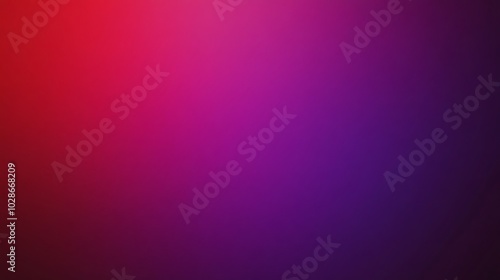 Abstract blurred background with red and purple gradient.