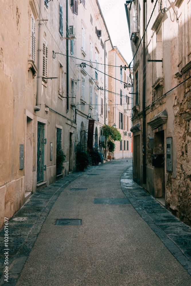 Fototapeta premium narrow street in the town