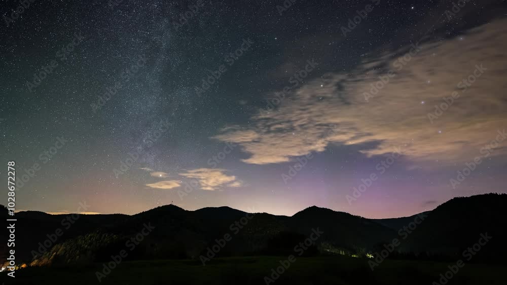 Milky way galaxy stars and light of aurora borealis over Europe countryside Astronomy Time lapse Milky way galaxy stars and light of aurora borealis over Europe countryside Astronomy Time lapse