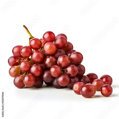 Cluster of ripe red grapes on a white background.