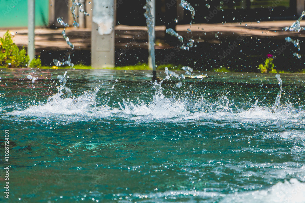 projection of green water in a fountain